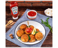 Ketchup bocabajo con 50% menos de azúcares HEINZ bote de 550 g.