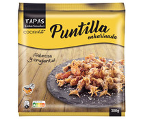 Puntilla limpia sin pluma y de textura muy crujiente, recubierta de una fina capa de harina COCINARTE 300 g.