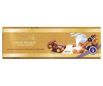 Chocolate suizo de leche con uvas pasas y avellanas enteras LINDT 300 gramos.