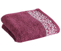 Toalla de tocador 100% algodón color rosa con cenefa floral, 500g/m² ACTUEL.